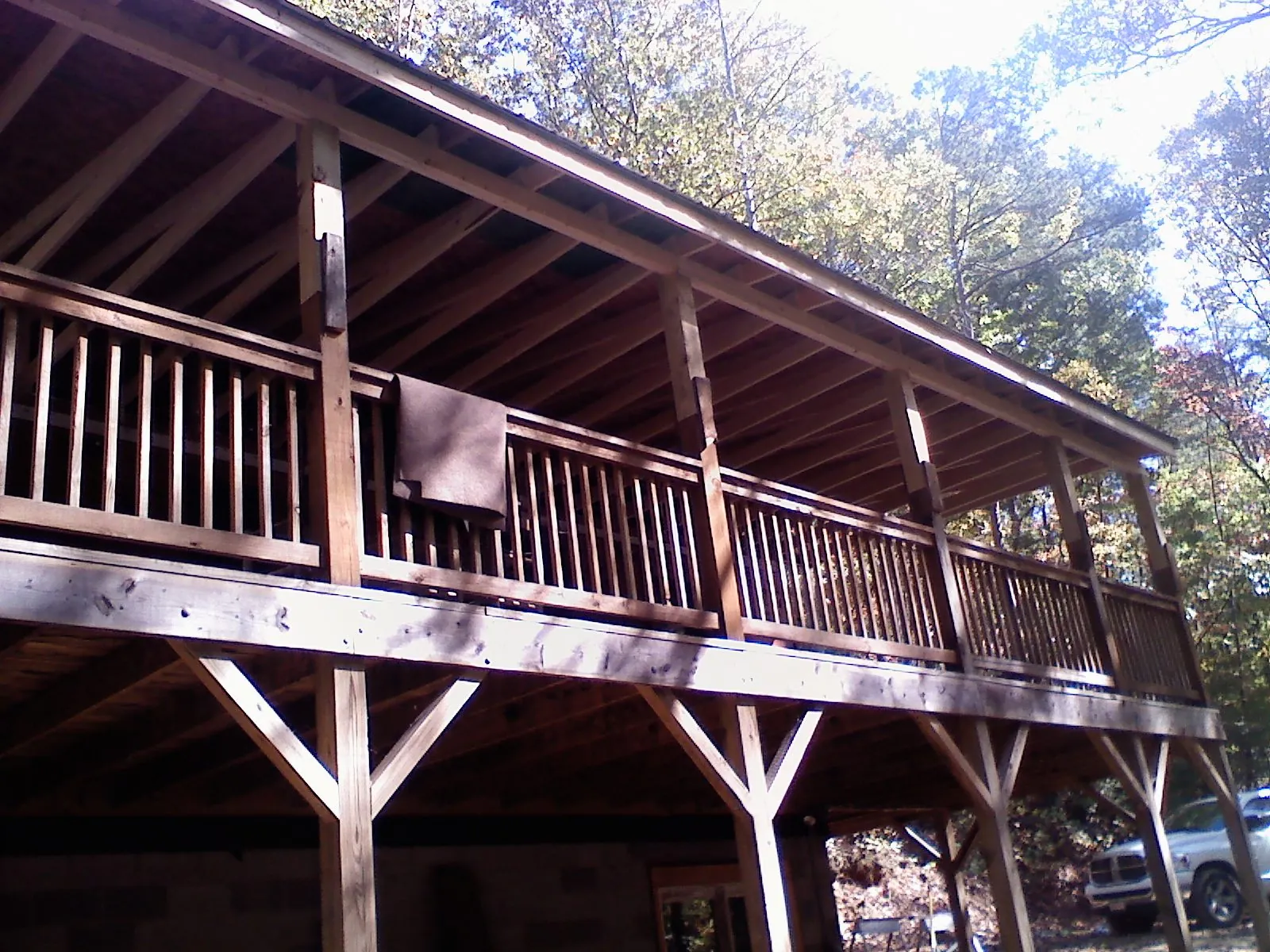 Timber framing under a new elevated porch and deck — Roof Leak Repair in Chariton by Roofing Brothers